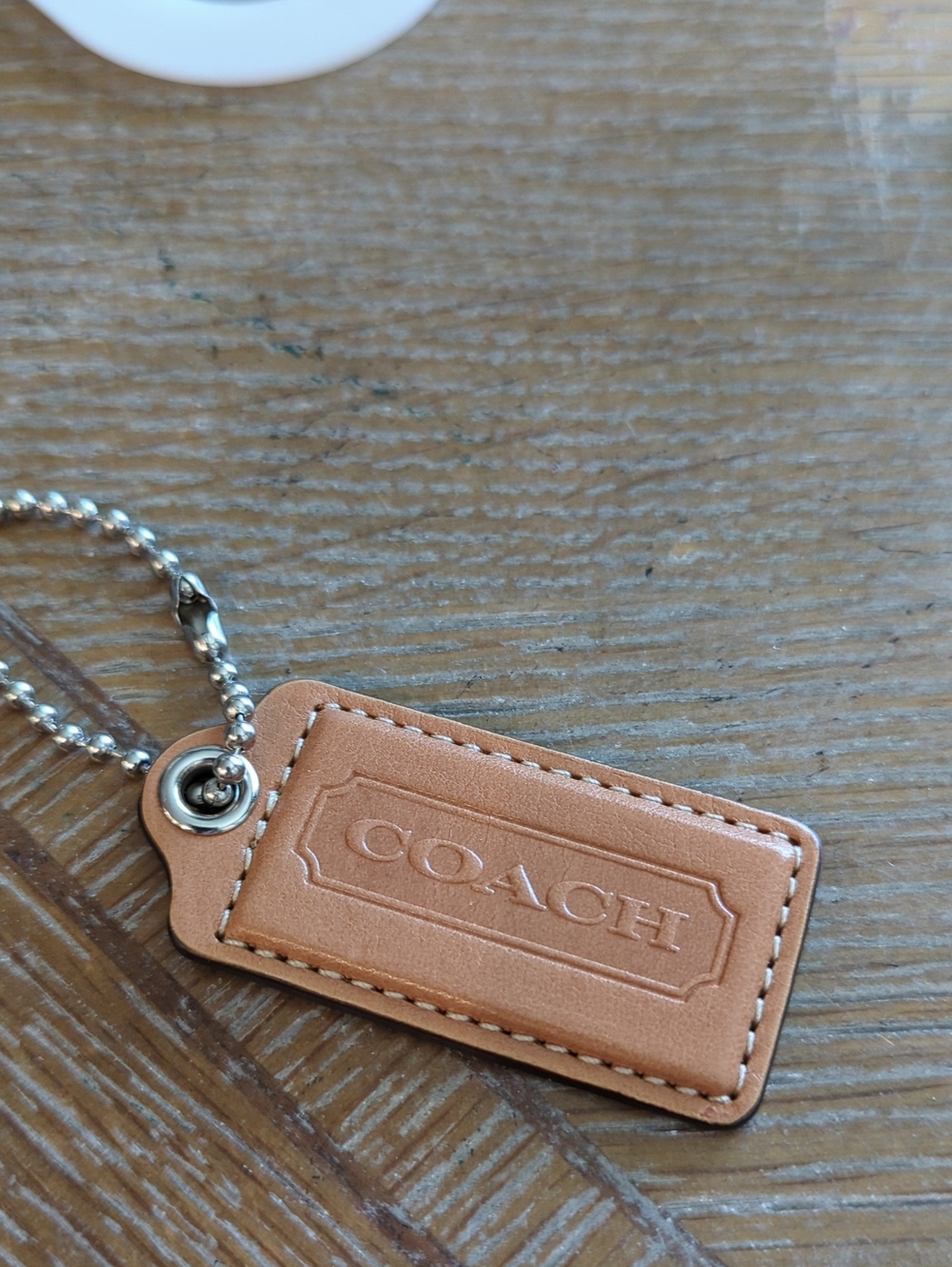 (0023) Coach Tan Leather Hang Tag
